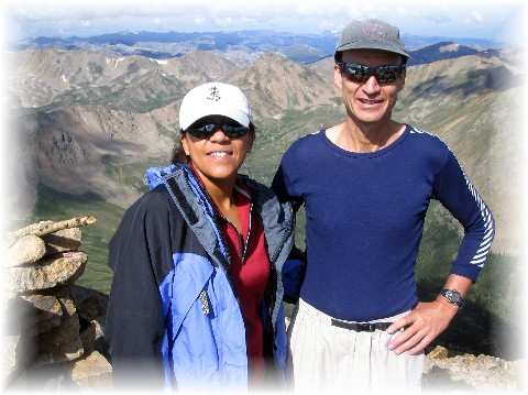 Rebekka and Steve on Elbert's summit; Casco in backdrop (in between us)