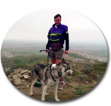 Steve and Sam the Wolfdog on the summit of White Butte, highest point in North Dakota