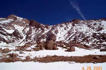 Right of basin (Keplinger's Couloir  is seen just right of Longs summit, leading to "notch")