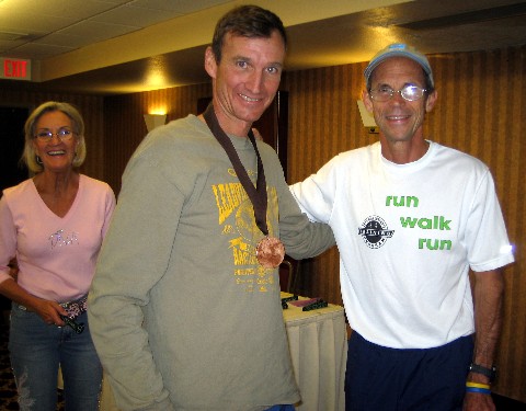 Steve gets award from Jeff Galloway